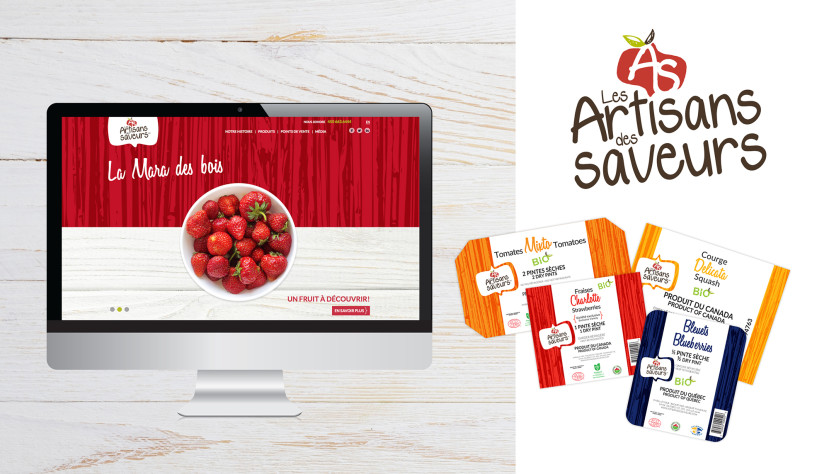 Écran d'ordinateur affichant fraises et emballages colorés de produits biologiques Les Artisans des Saveurs.