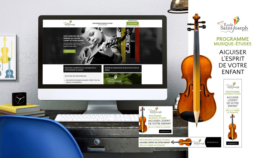 Bureau avec ordinateur affichant le site de l'École Saint-Joseph et une affiche de programme musique-études avec violon.